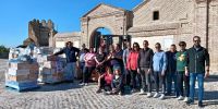 Sale de Madrigal de las Altas Torres un tráiler repleto de agua embotellada para Valencia